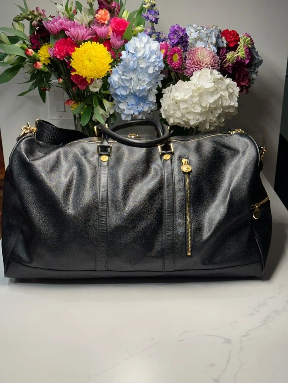 Versace Unisex Black Leather Duffel with Gold Medallion